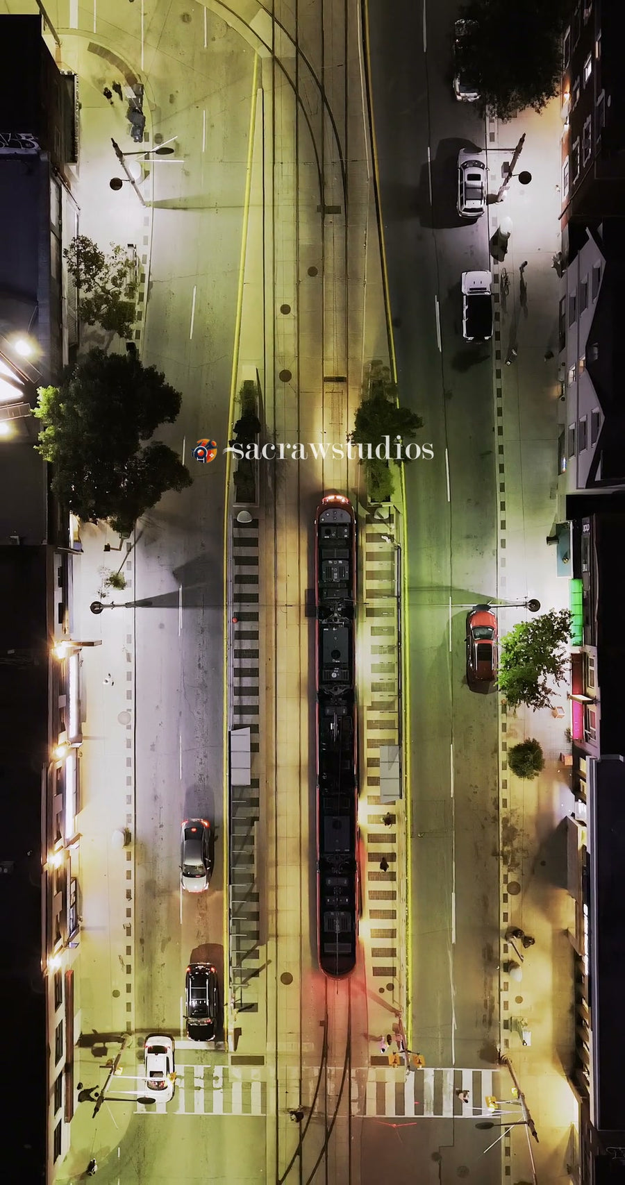 Night Streetcar on Lit City Road - Dynamic Zoom