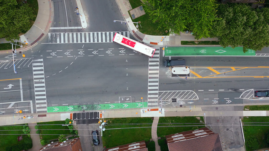 Busy City Intersection with Buses - Dynamic Zoom