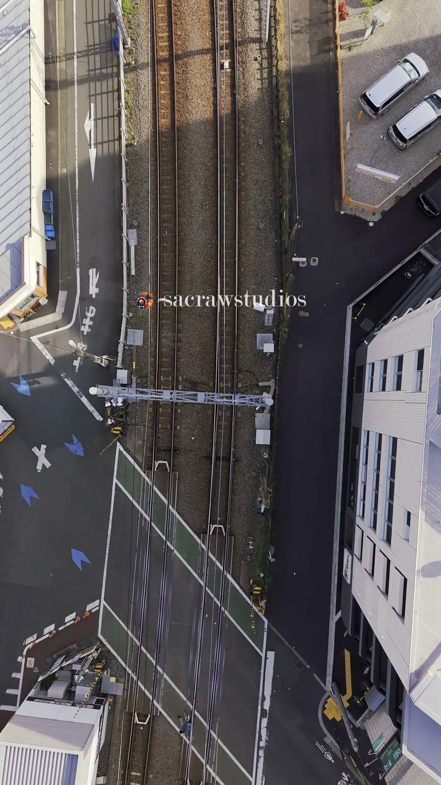 City Railroad Crossing Train Pass - Aerial Overhead