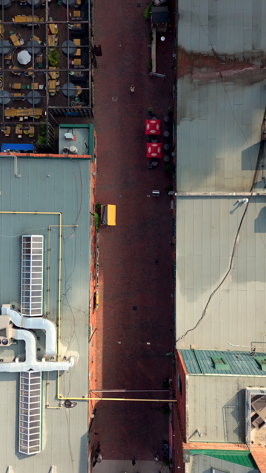 Colorful Urban Alleyway with Pedestrians - Aerial