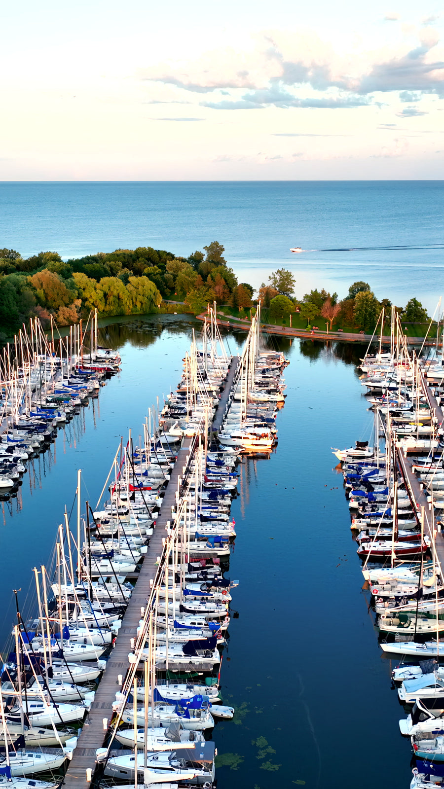 Marina Sailboats Sunset Calm Water - Aerial Pan
