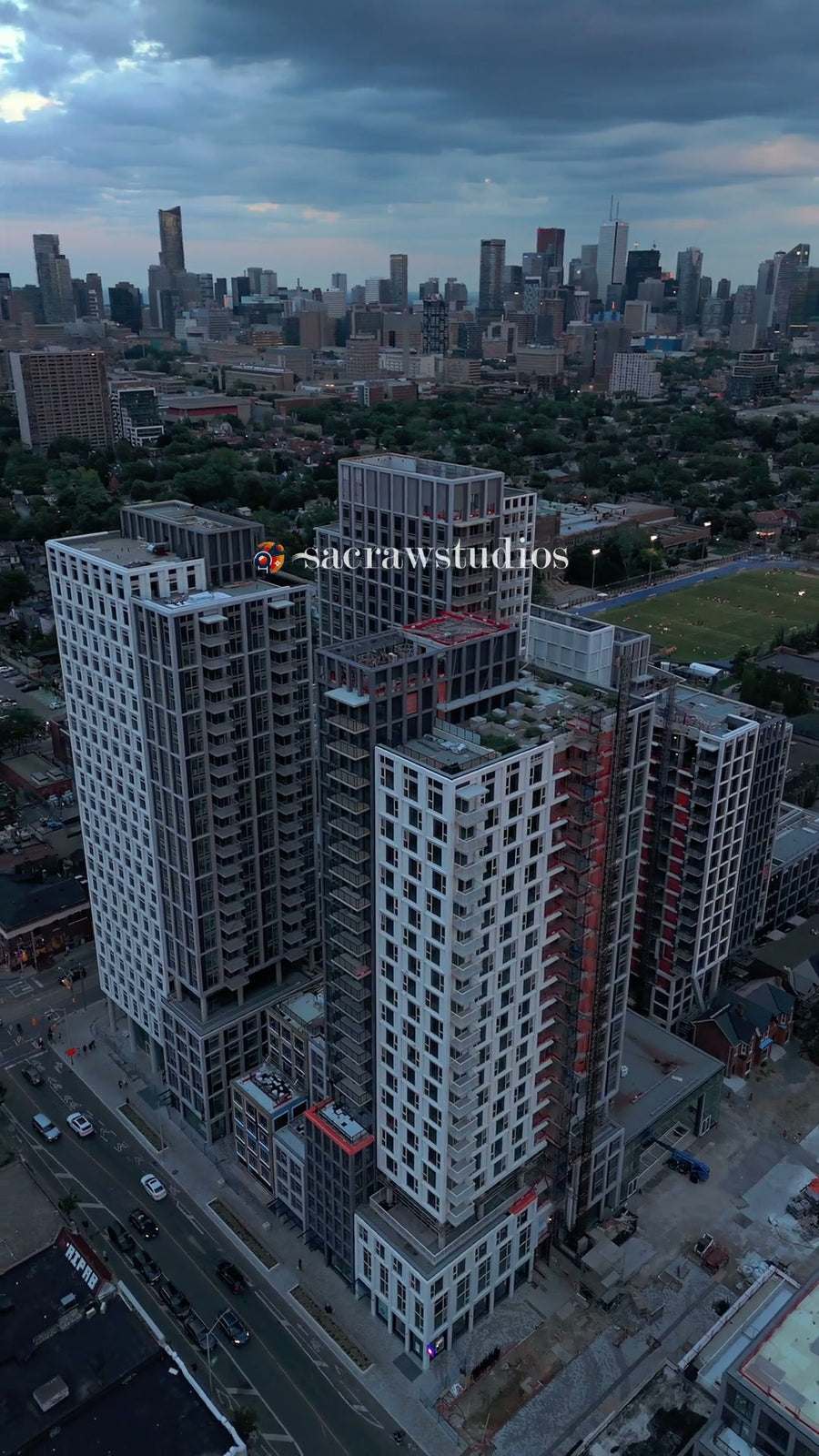 Residential Towers Dusk City Skyline - Aerial Pan