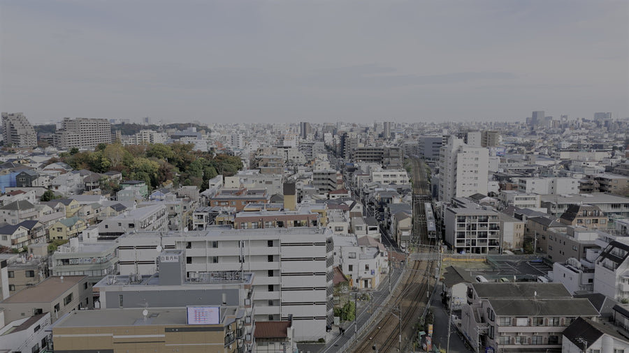 Tokyo Suburban Railway and Rooftops - Aerial