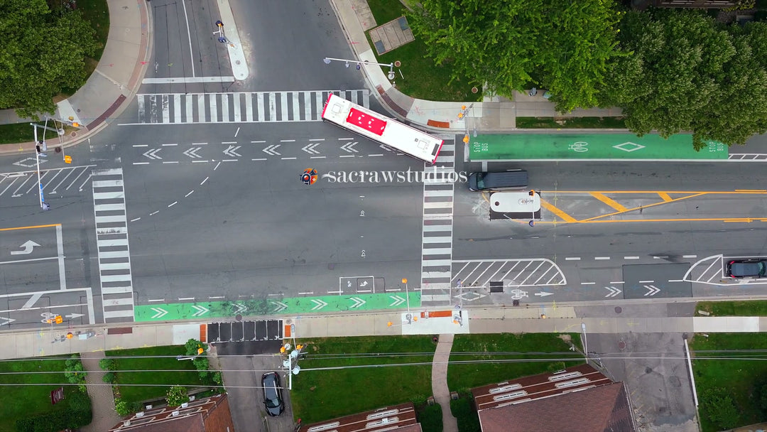 Aerial View of Urban Intersection with Buses and Traffic
