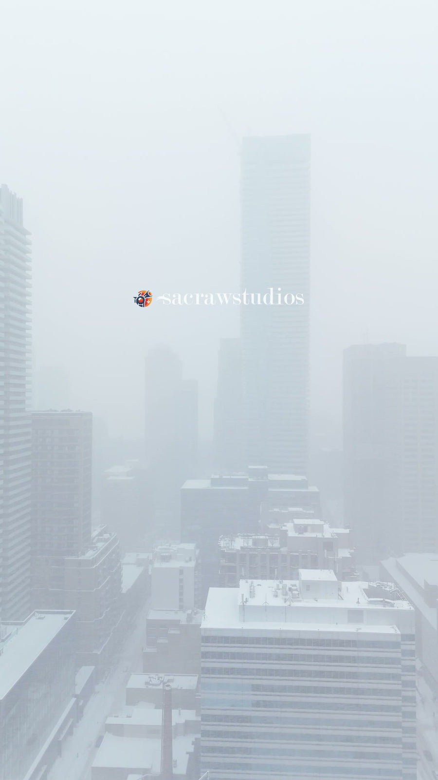 Foggy City Skyline in Winter Snow - Aerial Flythrough