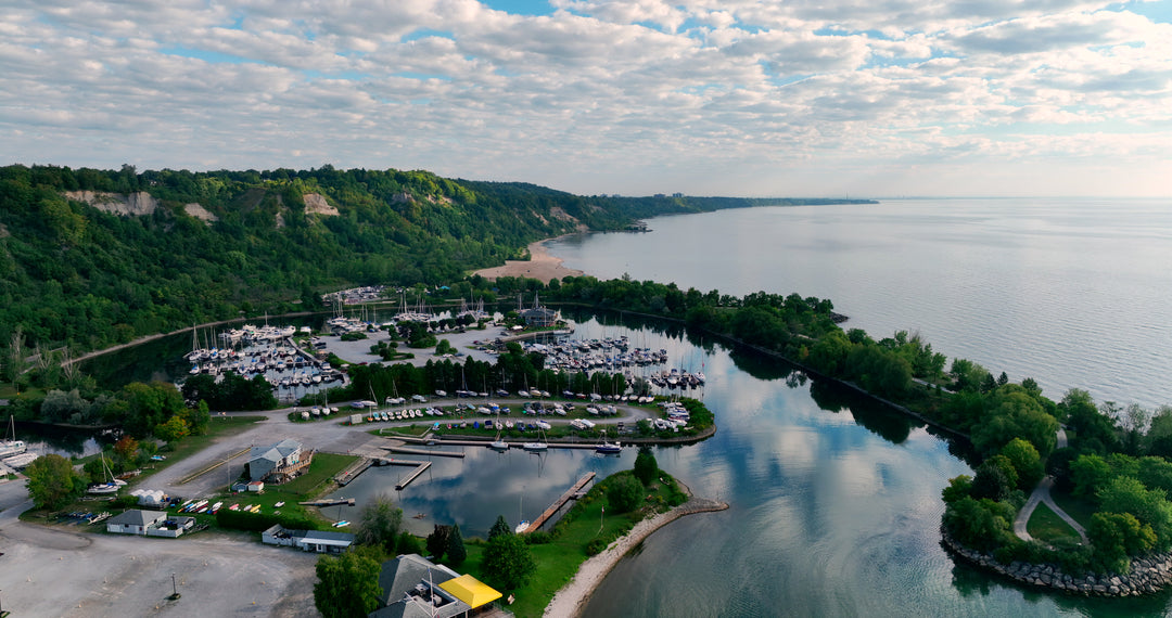 Coastal Marina with Docked Boats - Aerial — 4K stock footage