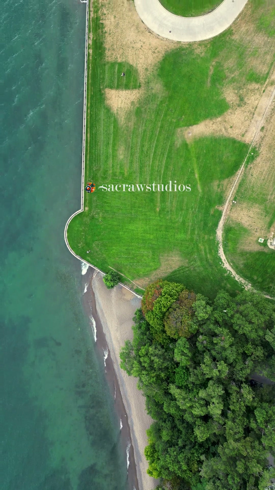 Coastal Park Pathway Ocean Shore - Aerial Tracking