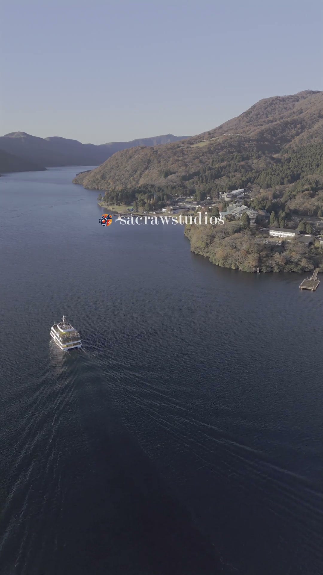 Lake Shore Autumn Ferry Crossing - Aerial Tracking