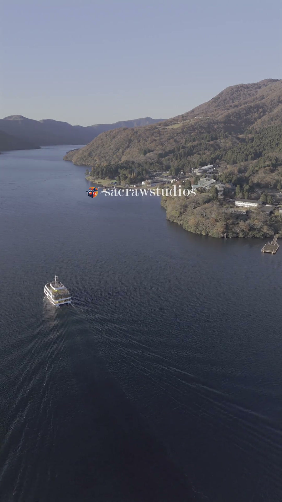 Lake Shore Autumn Ferry Crossing - Aerial Tracking