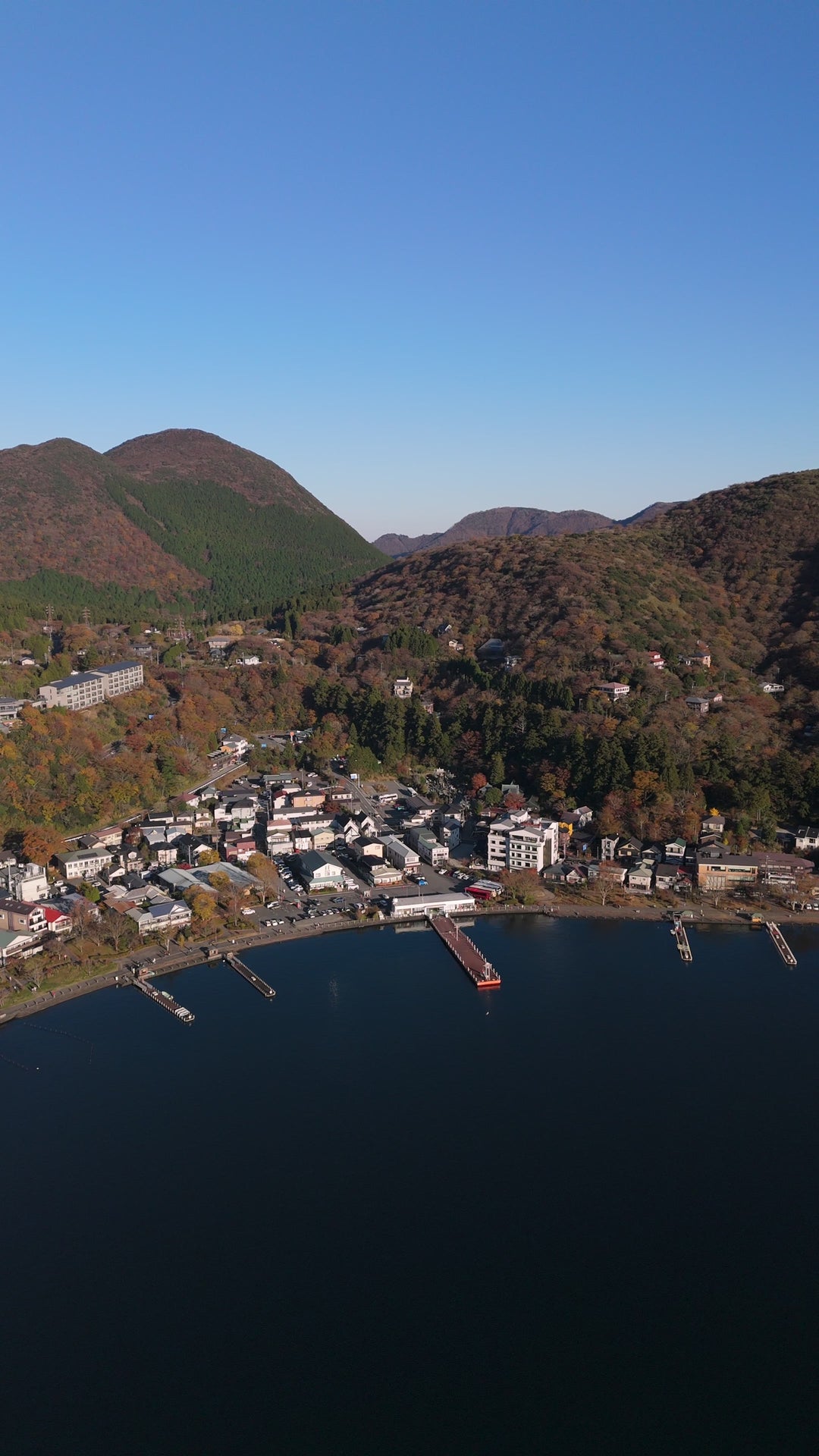 Lakeside Mountain Village in Autumn - Aerial in Japan — 4K stock footage