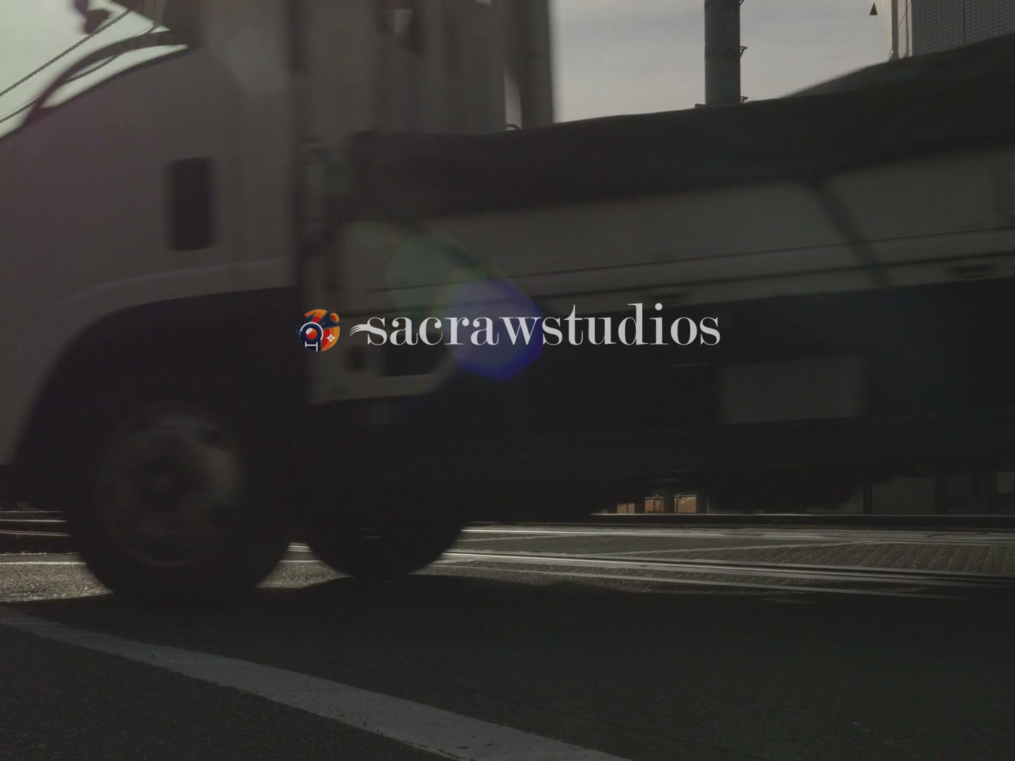 Japan Railway Crossing Early Morning Commute - Low Angle at golden hour — 4K stock footage