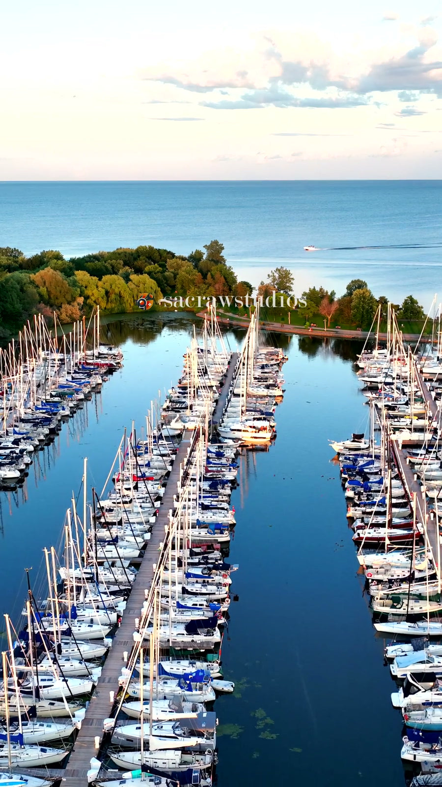 Marina Sailboats Sunset Calm Water - Aerial Pan