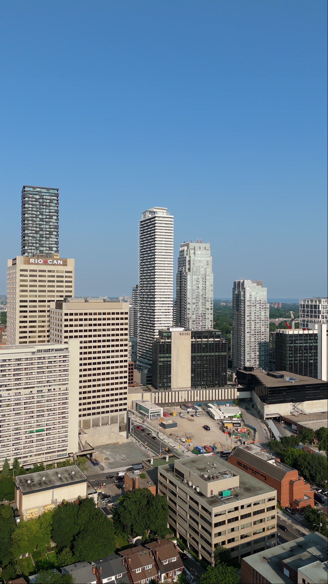 Modern Downtown City Skyline with Construction Site - Aerial in Toronto — 8K stock footage