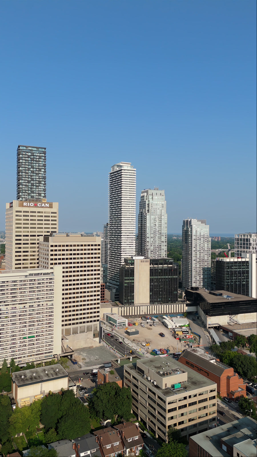Modern Downtown City Skyline with Construction Site - 8K Aerial