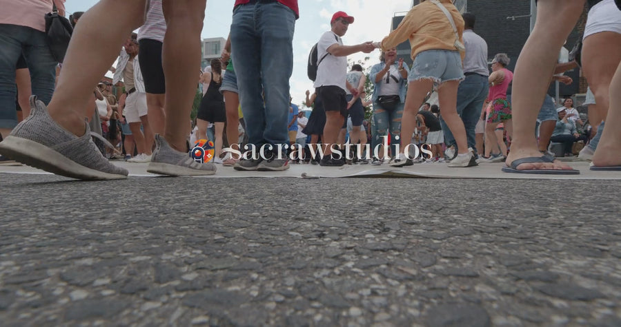 Outdoor Street Festival Crowd Dancing Feet - Low Angle