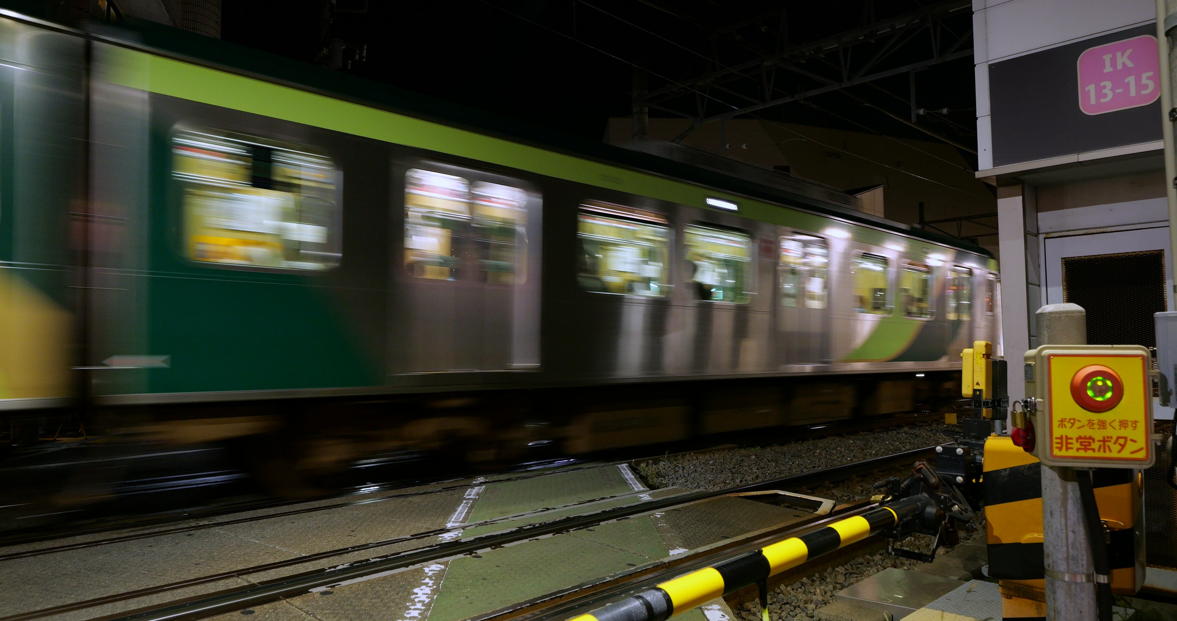 Railroad Crossing Night Train Passing - Street Level — 4K stock footage