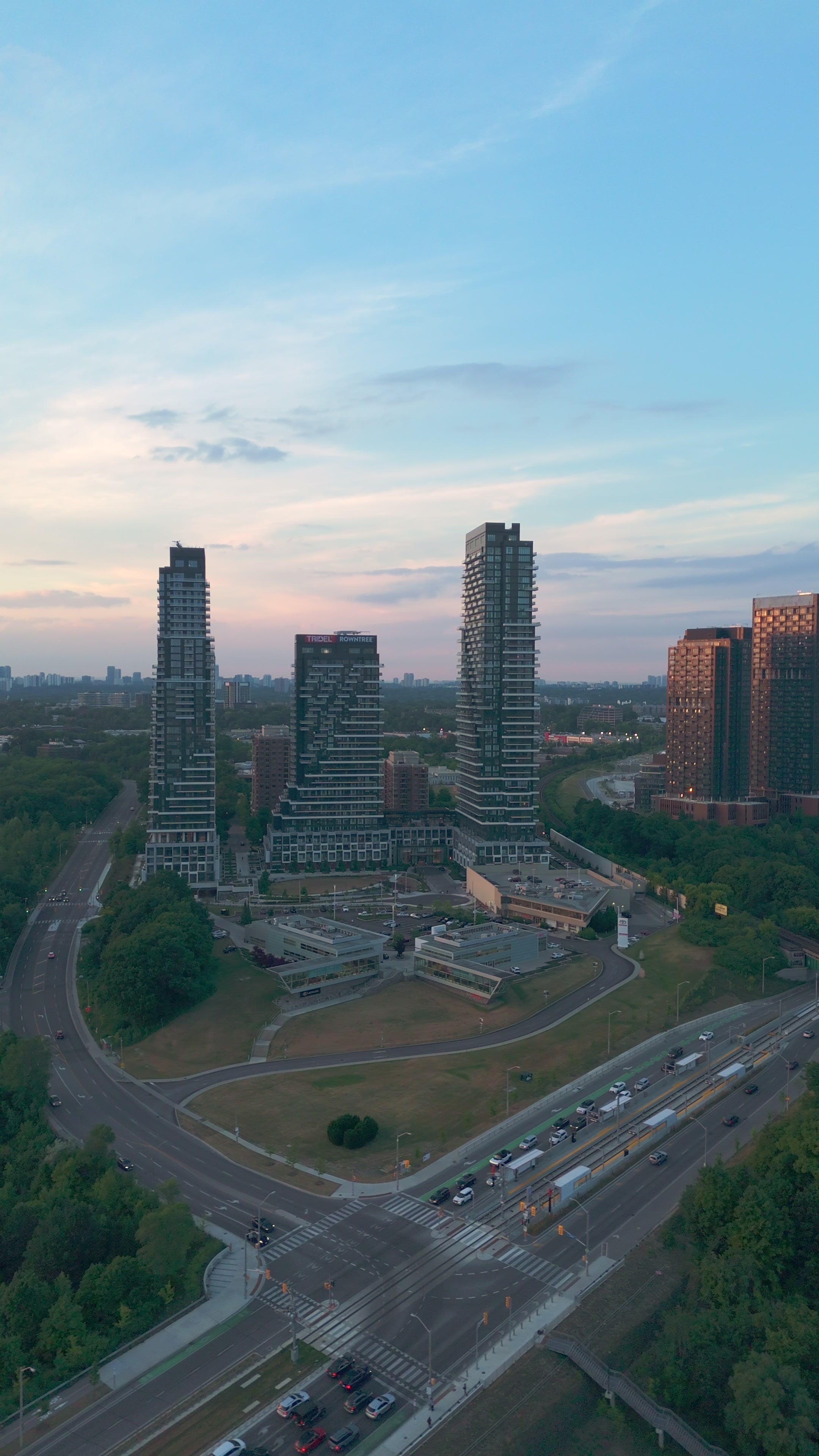 Residential Towers Warm Sunset Light - Aerial Drift — 4K stock footage