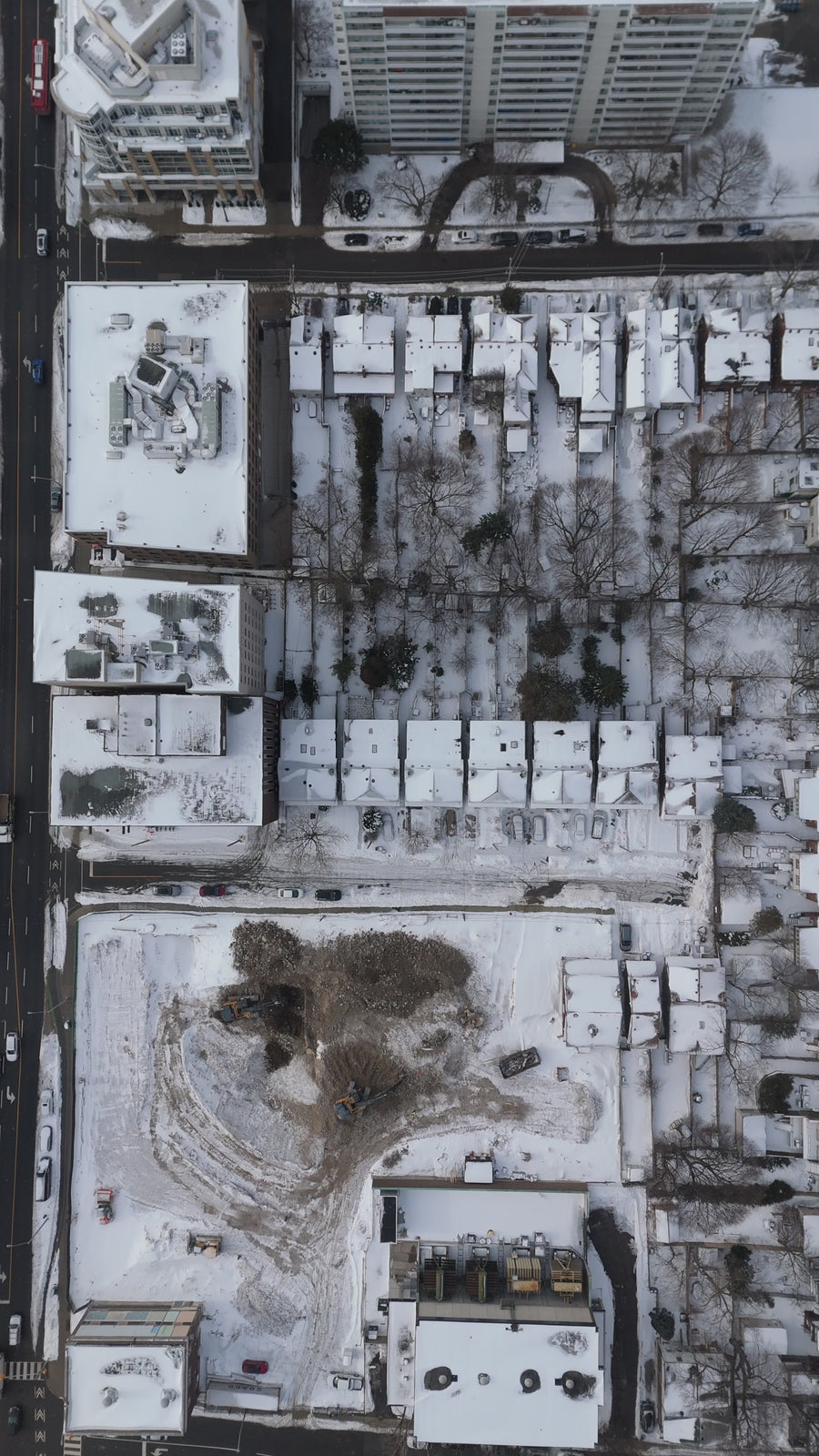 Snowy Residential Streets in Winter - Top Down Tracking
