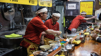Three Behind the Counter in Tokyo — fine-art print