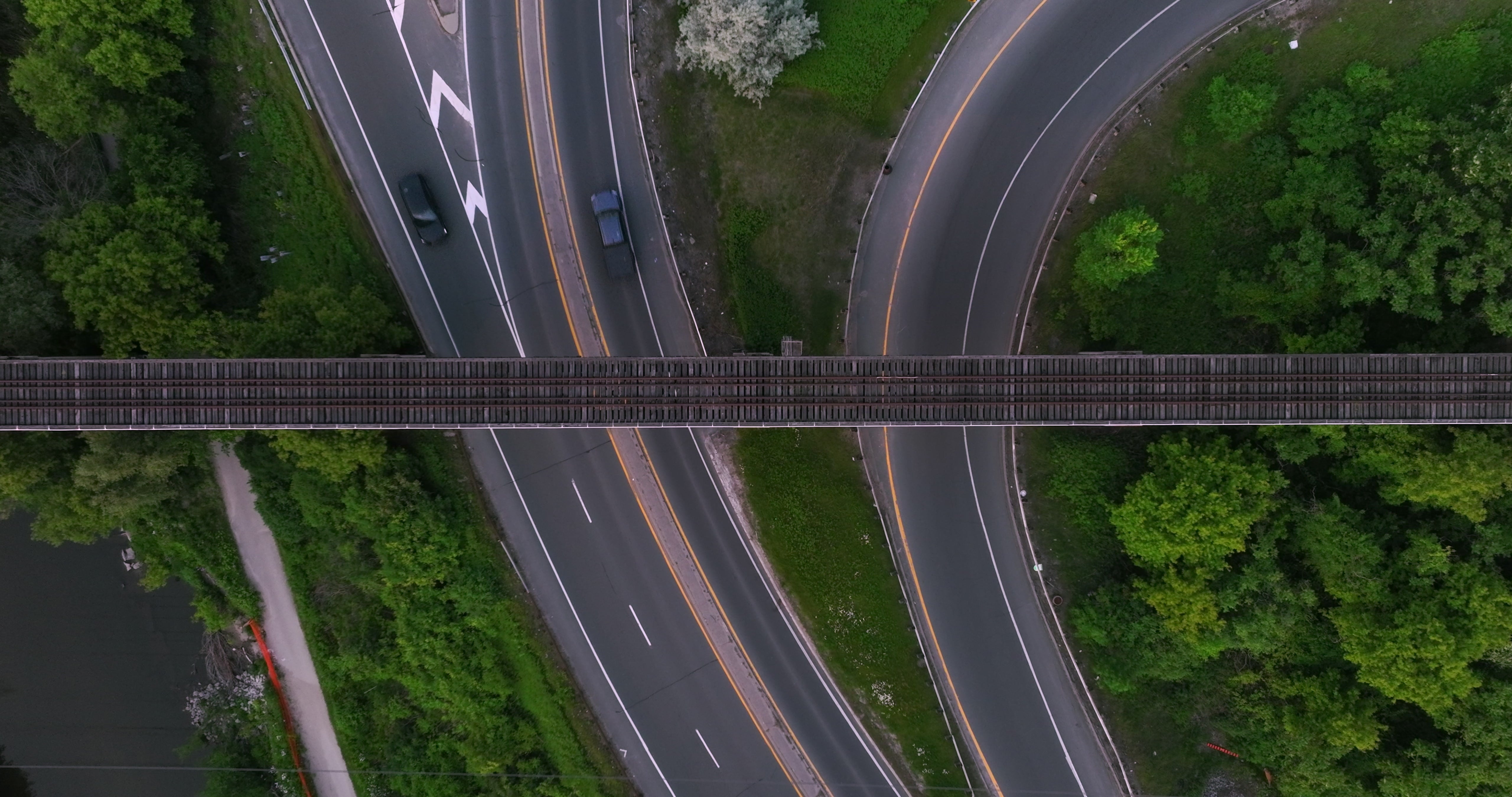Highway Interchange with Railway Bridge - Top Down — 4K stock footage