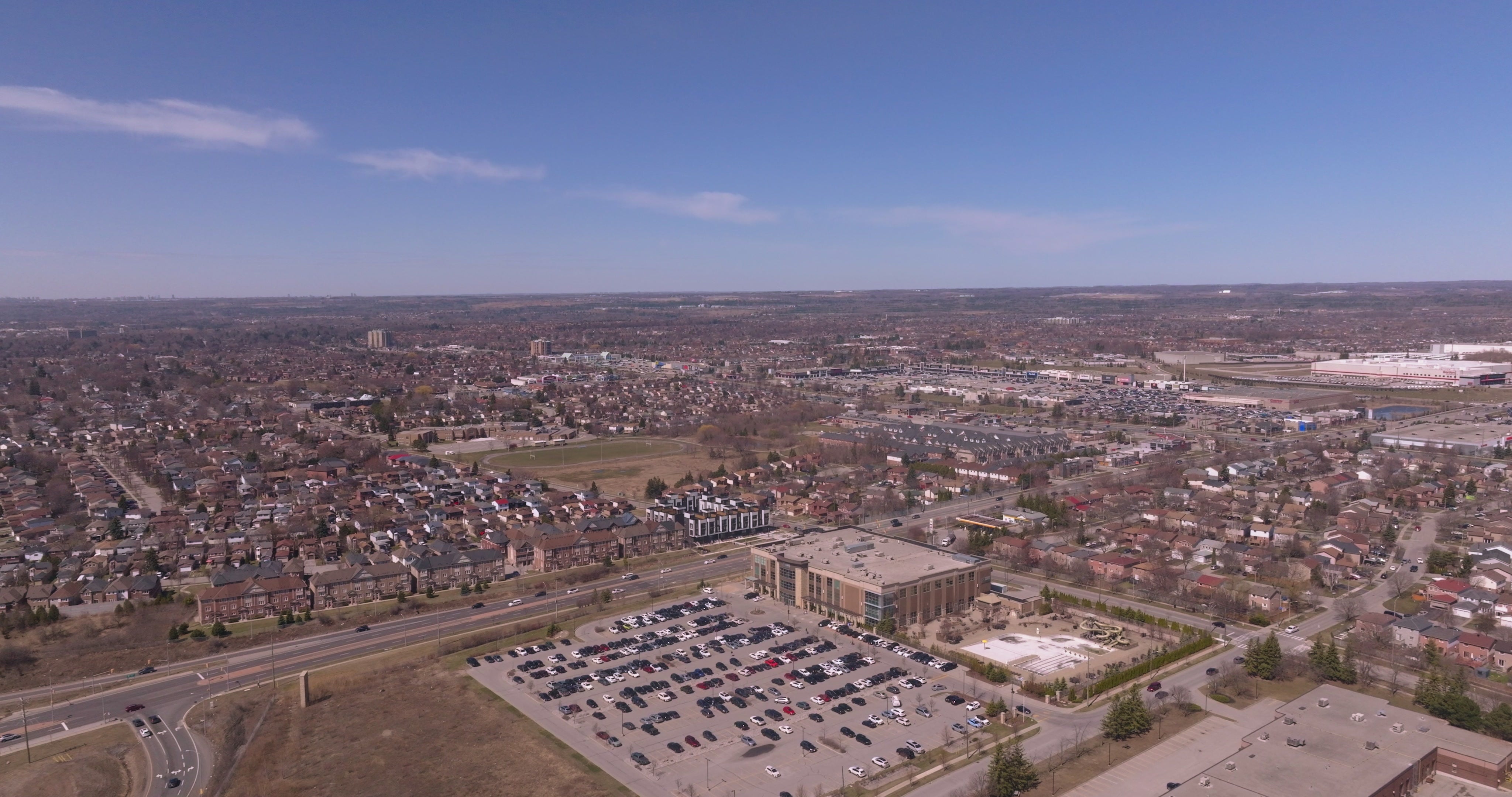 Suburban Cityscape with Commercial Building and Highway - Aerial in Toronto — 4K stock footage