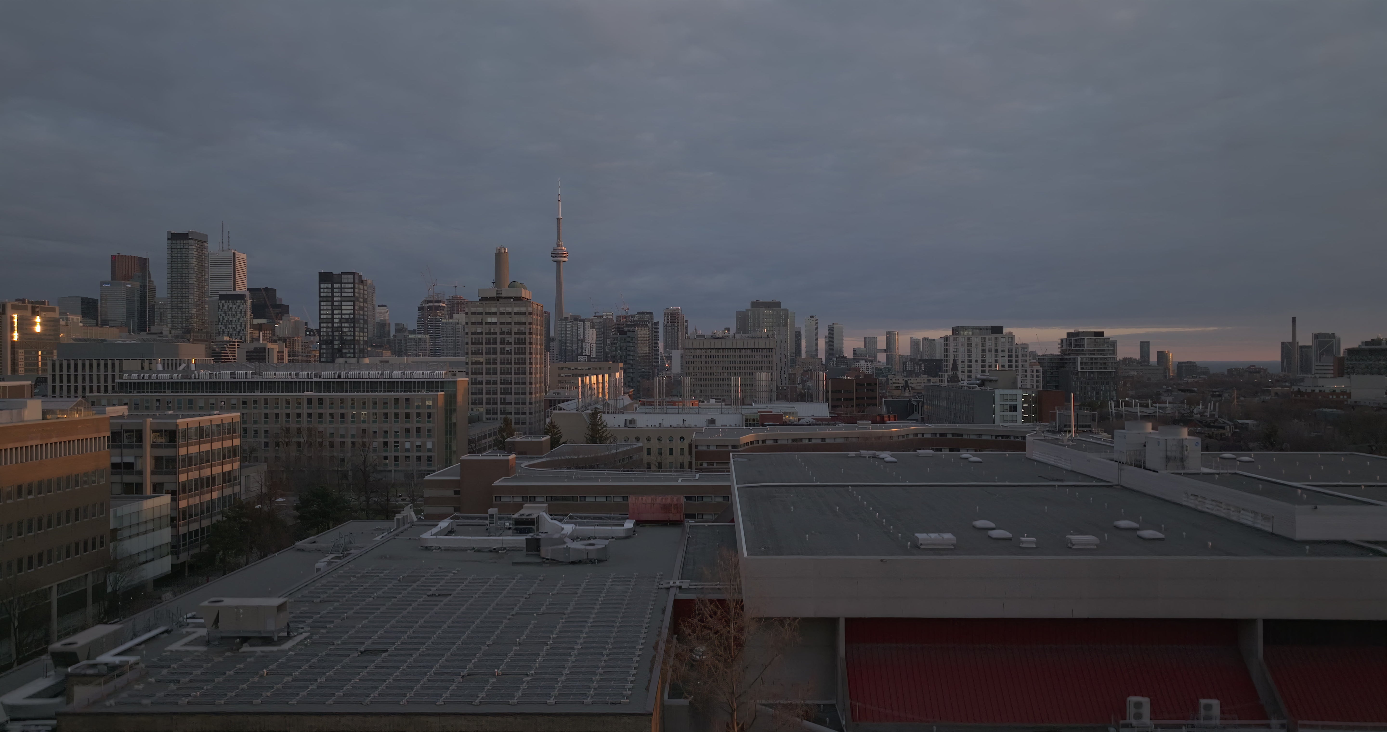 Toronto Skyline at Dusk with Toronto Tower - Aerial at golden hour — 4K stock footage