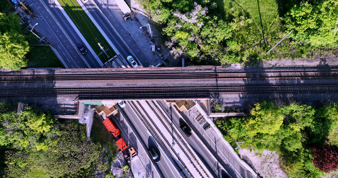 Aerial Top Down View of Highway and Railway Bridge Intersection — Premium 4K stock footage