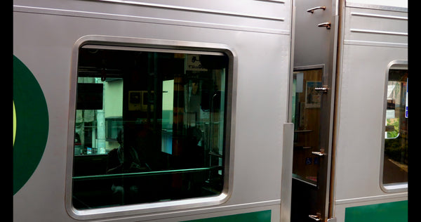 Tokyu Corporation Train Passing Platform in Tokyo Japan