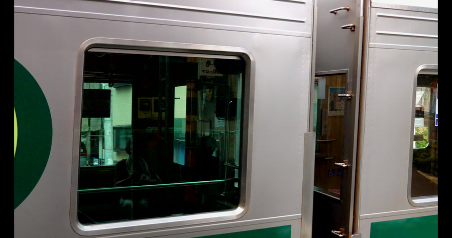 Tokyu Corporation Train Passing Platform in Tokyo Japan