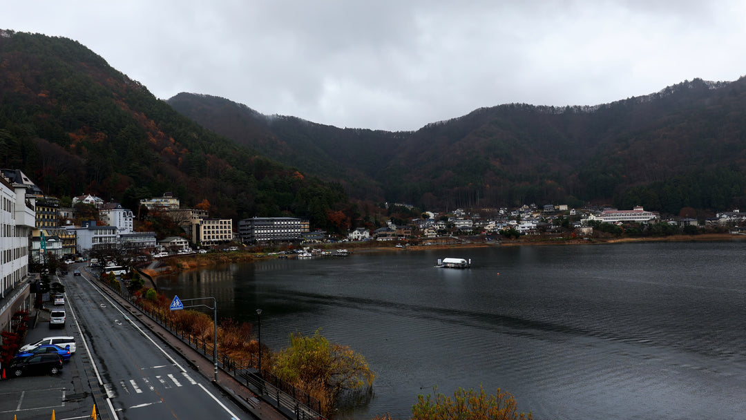 Misty Mountain Lake Town with Traffic Time Lapse