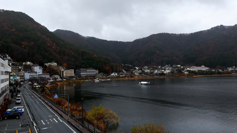 Misty Mountain Lake Town with Traffic Time Lapse