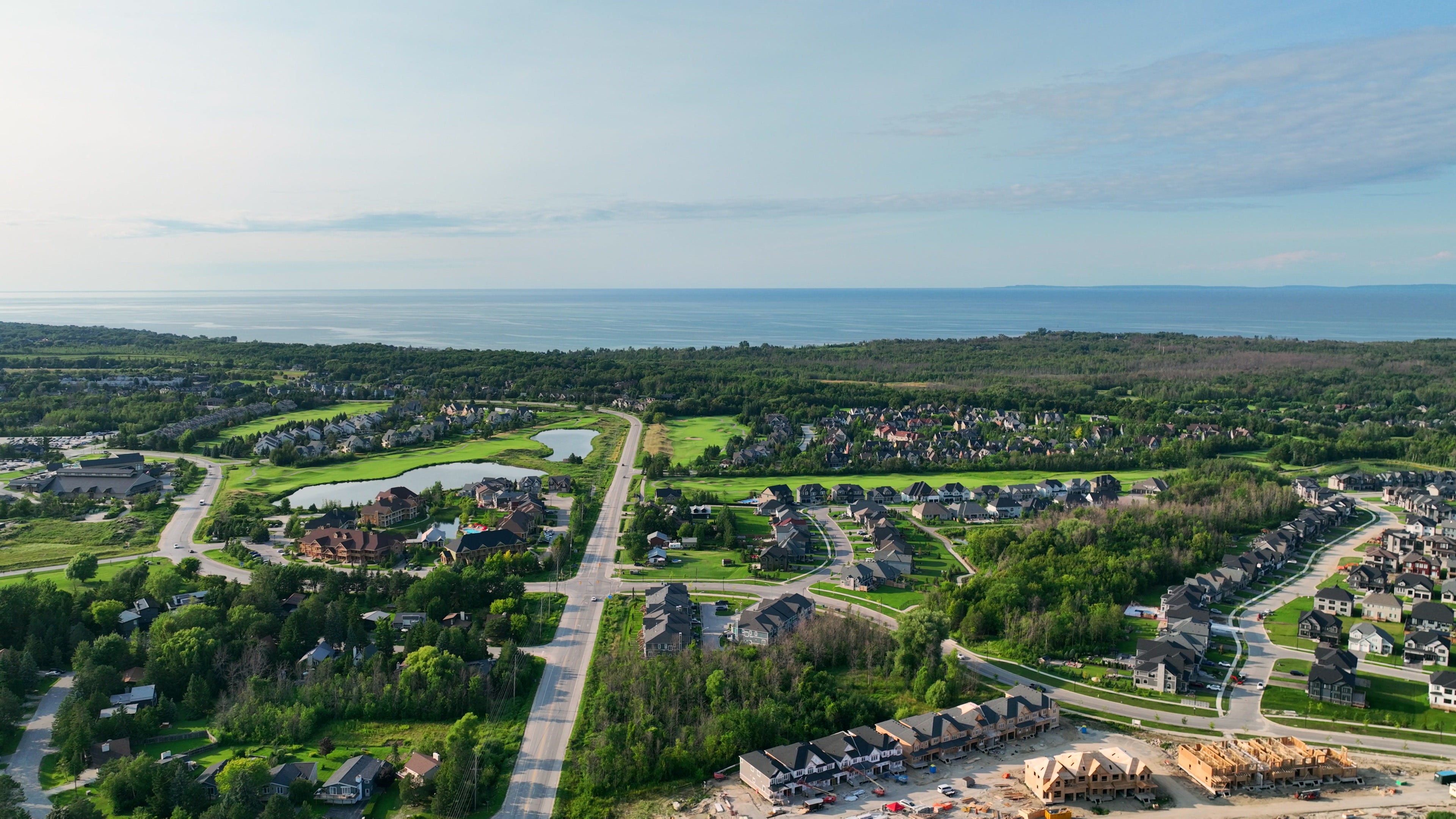 Coastal Suburban Neighborhood with Golf Course - Aerial in Toronto in summer — 4K stock footage