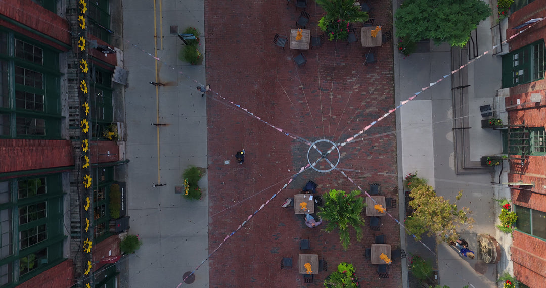 Aerial Top Down View of Urban Pedestrian Alley with Brick Pavement — Premium 4K stock footage