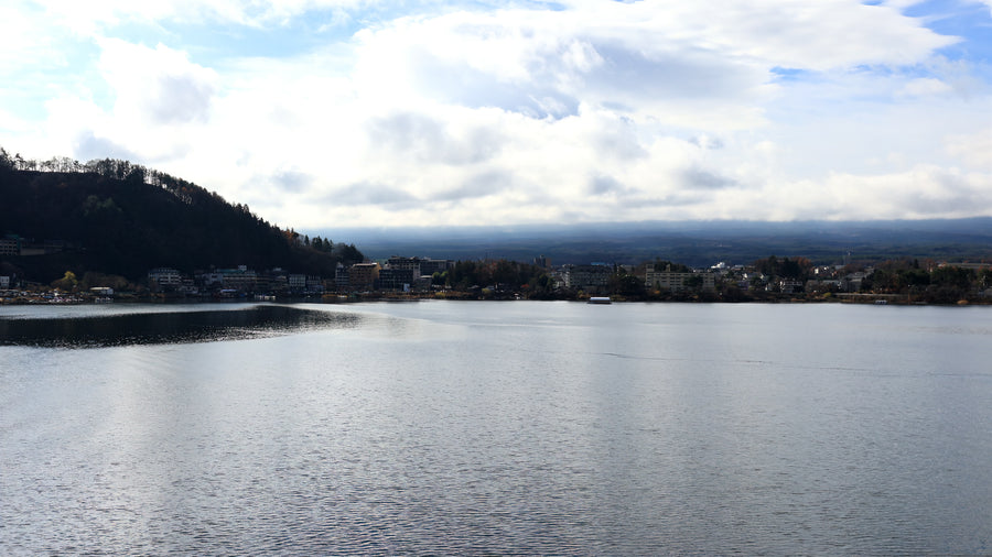 Mount Fuji Emerging from Clouds Over Lake Kawaguchi