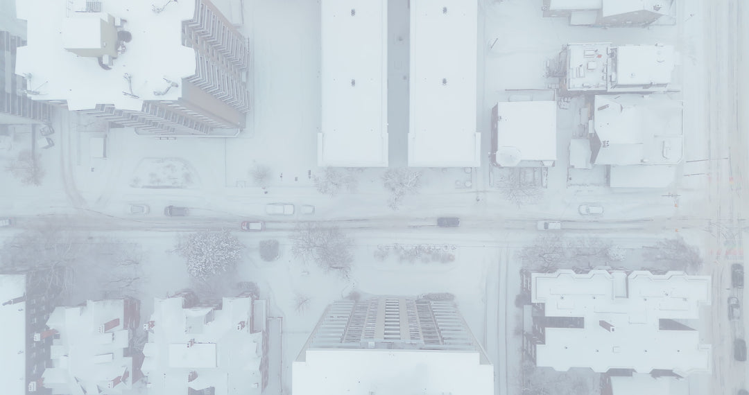 Snowy Toronto City Street in Winter Fog - Aerial — 4K stock footage
