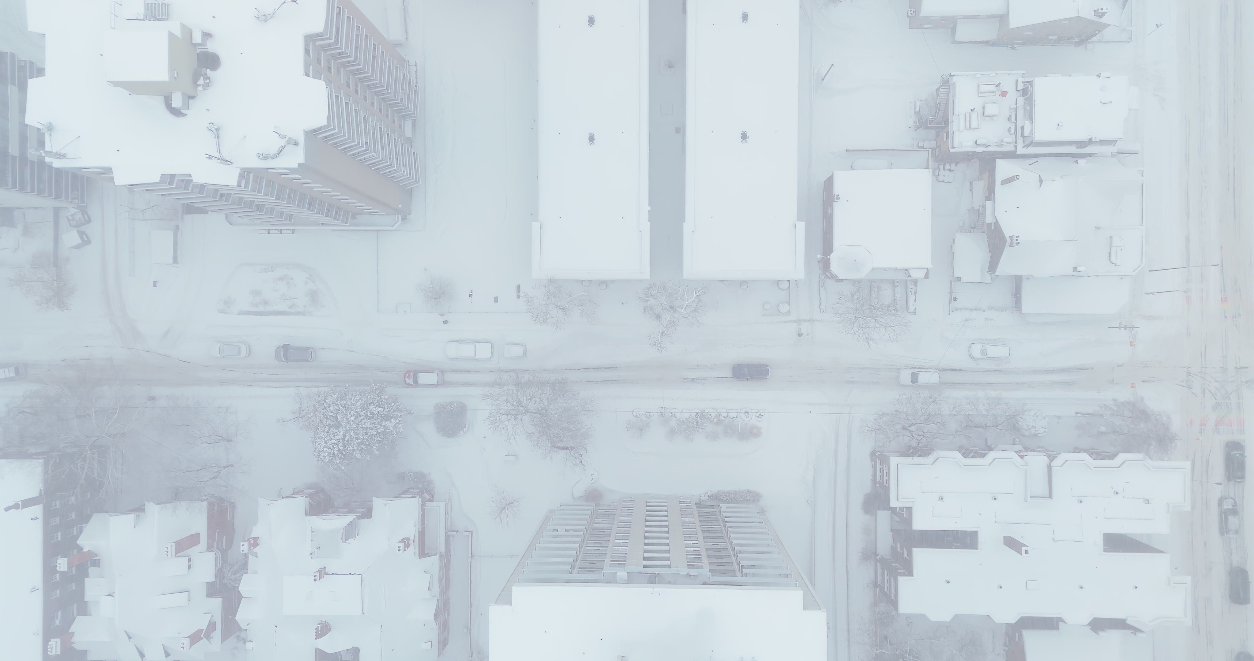 Snowy Toronto City Street in Winter Fog - Aerial — 4K stock footage