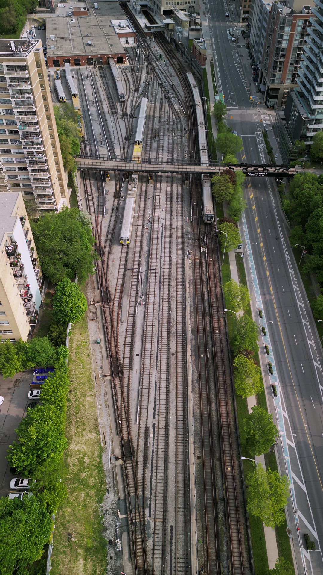 Toronto Railway Yard with Moving Trains - Top Down — 4K stock footage