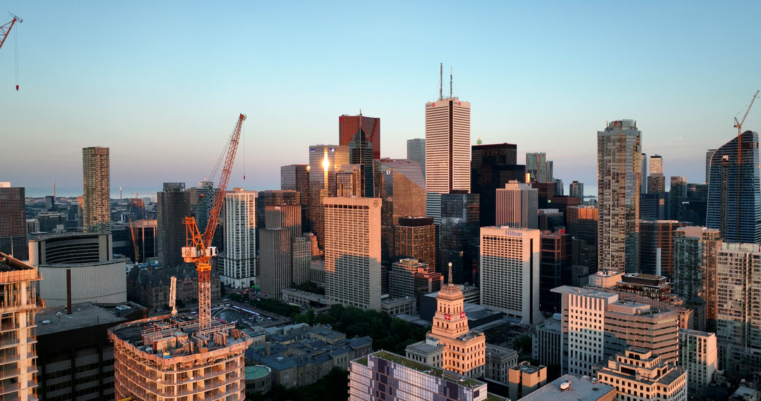 Toronto Downtown Skyline at Golden Hour with Construction Cranes
