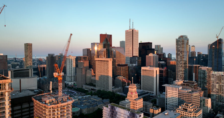 Toronto Downtown Skyline at Golden Hour with Construction Cranes
