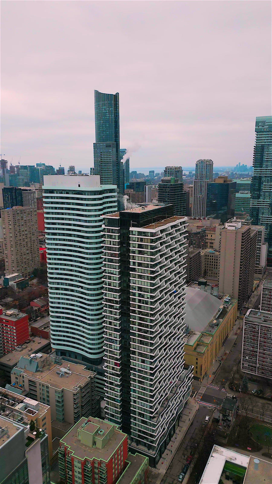 Toronto Skyline with CN Tower at Dusk - 4K Aerial