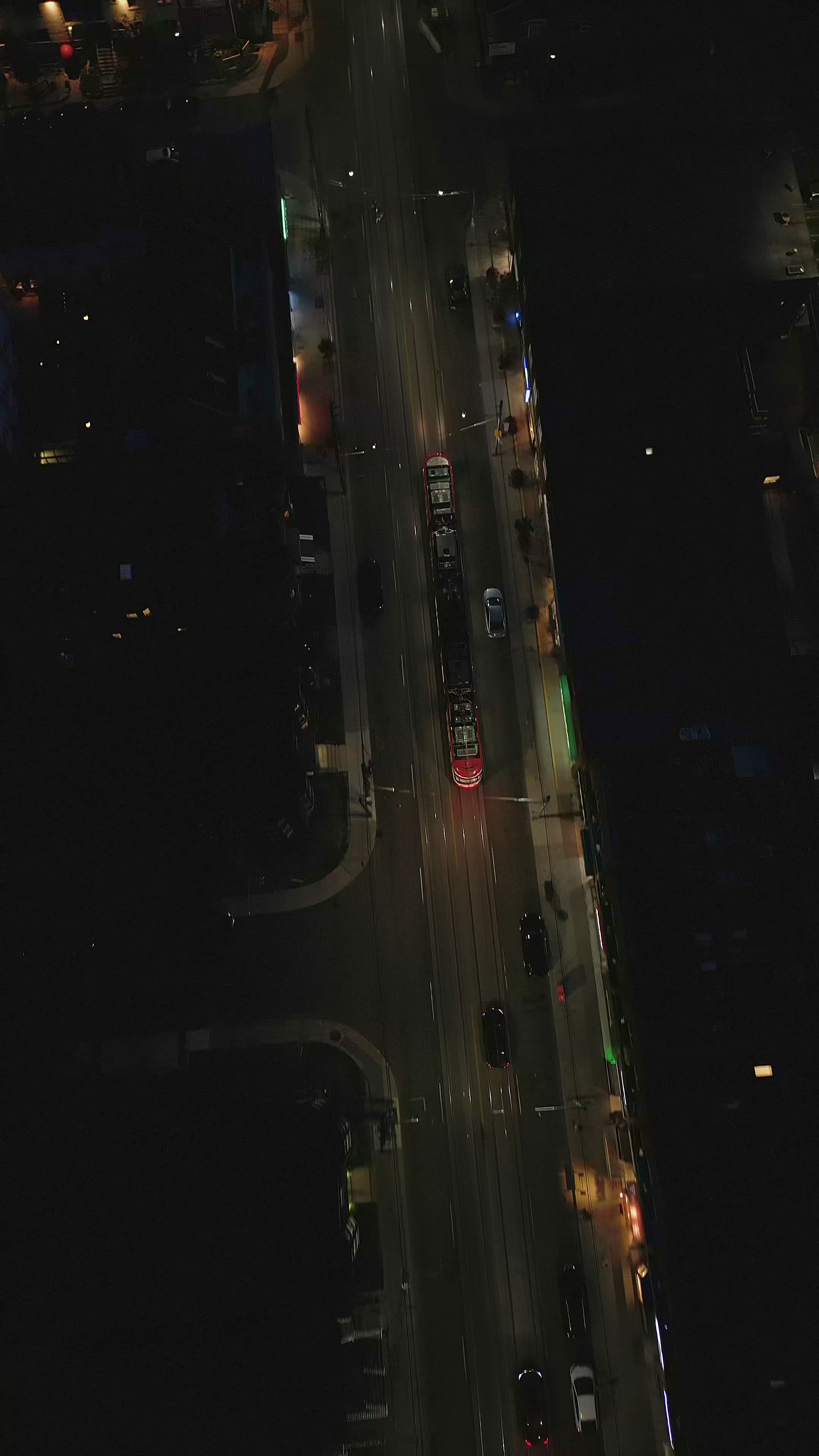 Toronto Red Tram at Night - Top Down Aerial — 4K stock footage