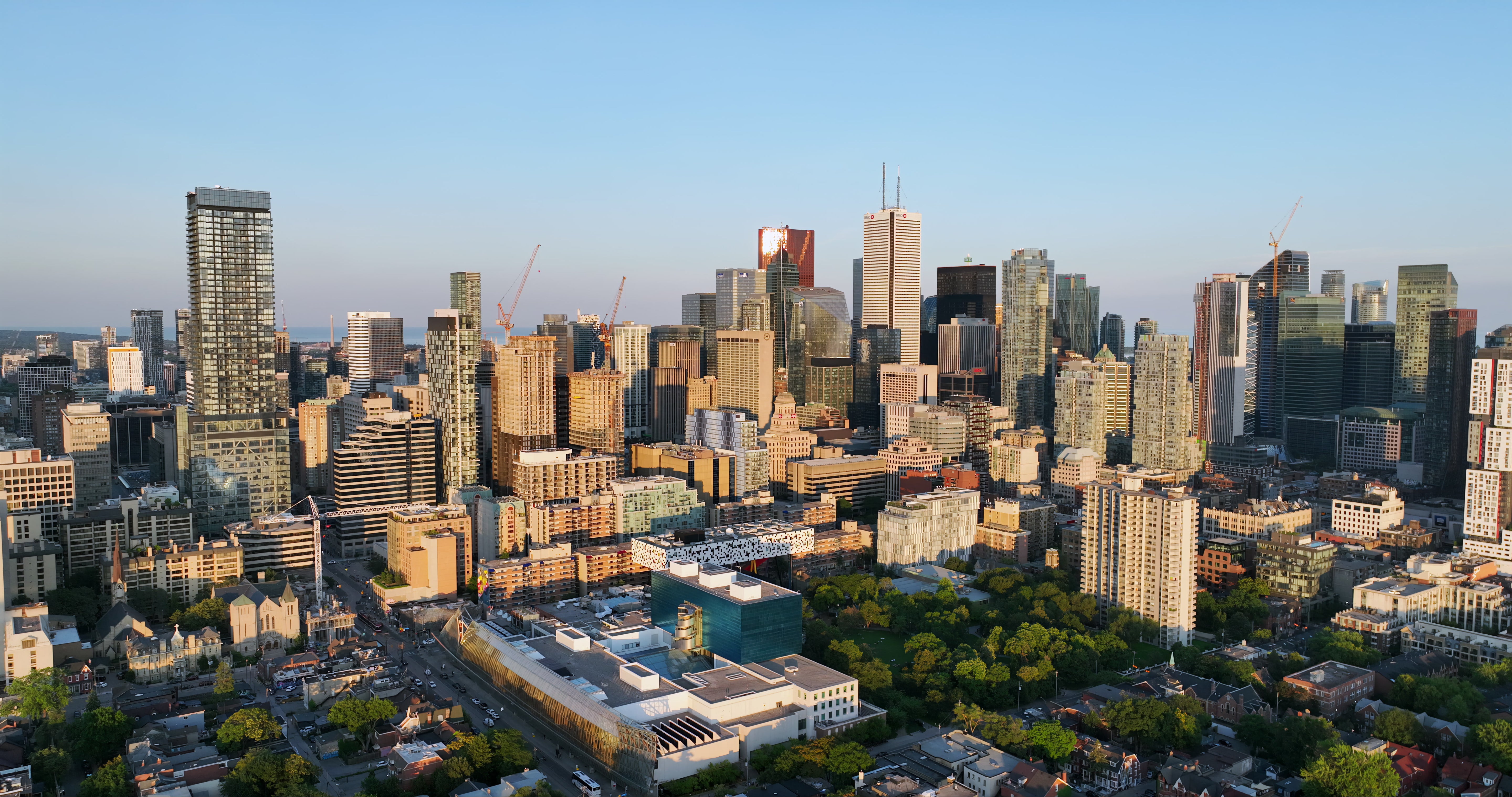 Toronto Skyline at Golden Hour with Modern Skyscrapers - Aerial — 4K stock footage