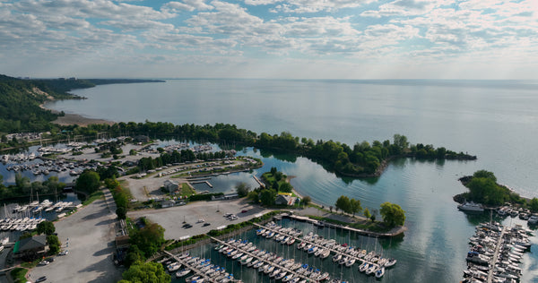 Coastal Marina Sailboats and Calm Waters - 5K Aerial