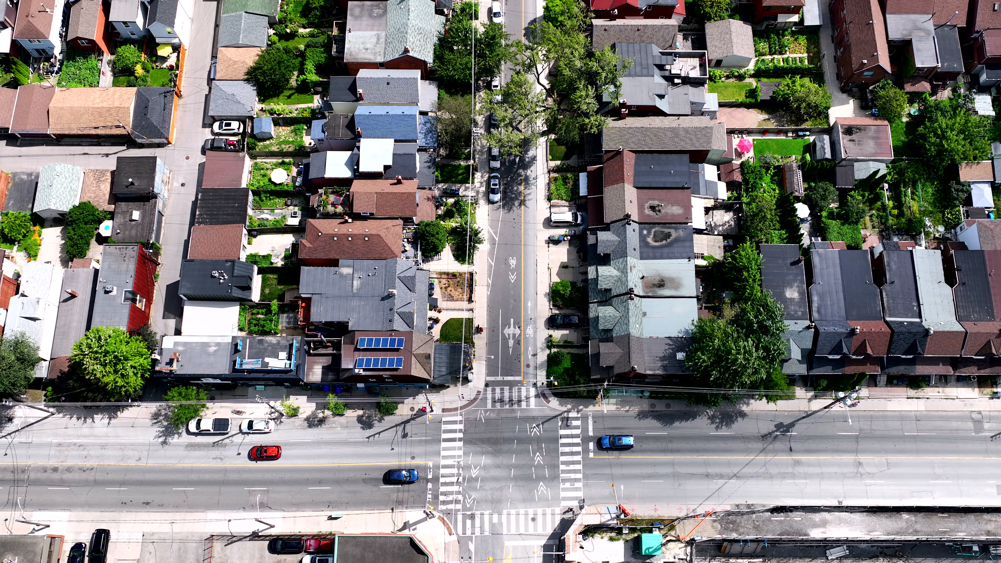 Residential Neighborhood with Traffic Intersection - Aerial in Toronto in summer — 4K stock footage