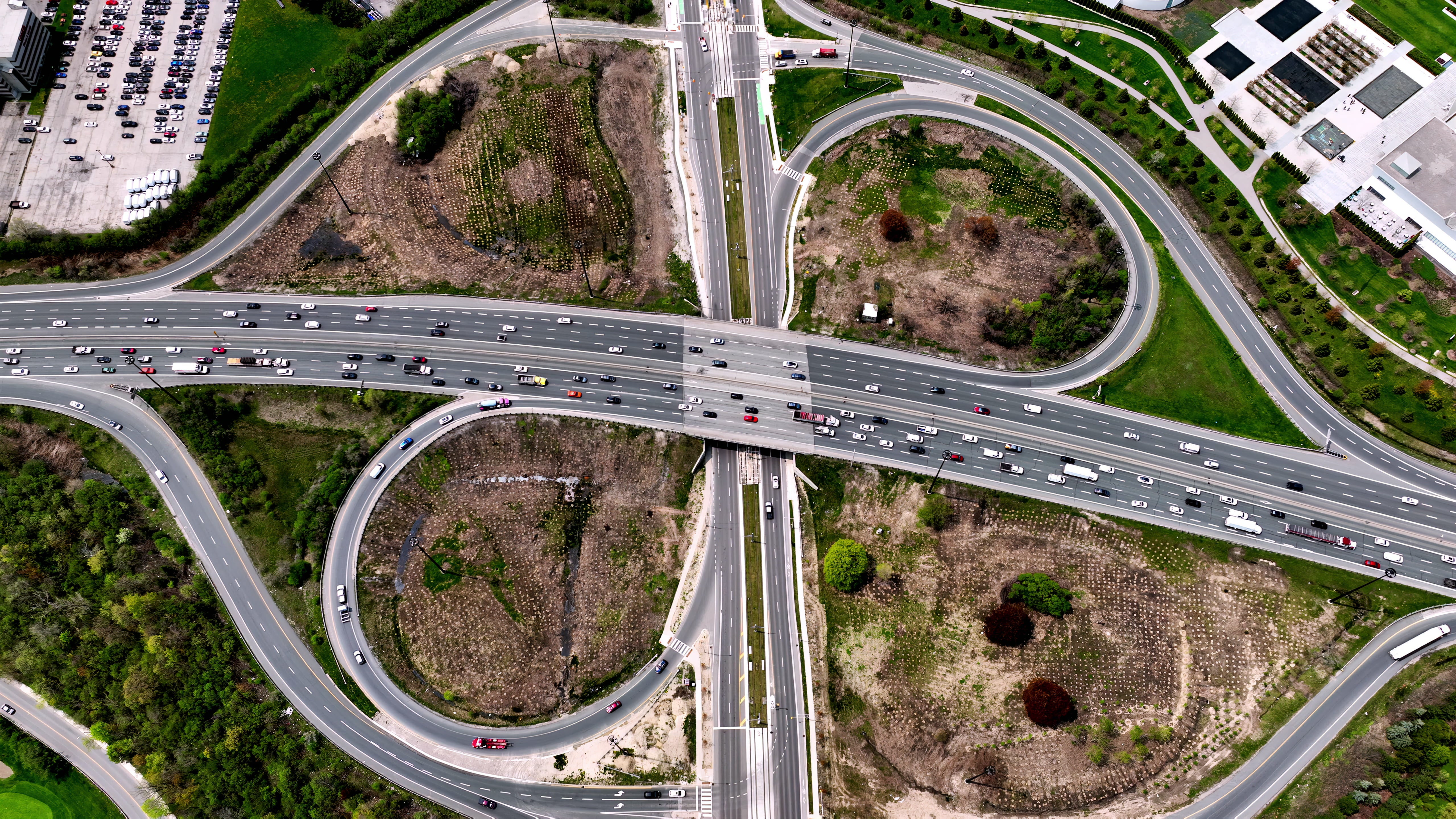 Busy Highway Interchange Cloverleaf Ramps - Aerial — 4K stock footage