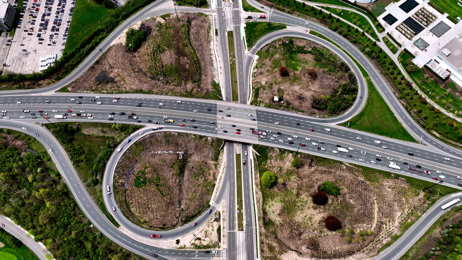 Busy Highway Interchange Cloverleaf Ramps - 5K Aerial