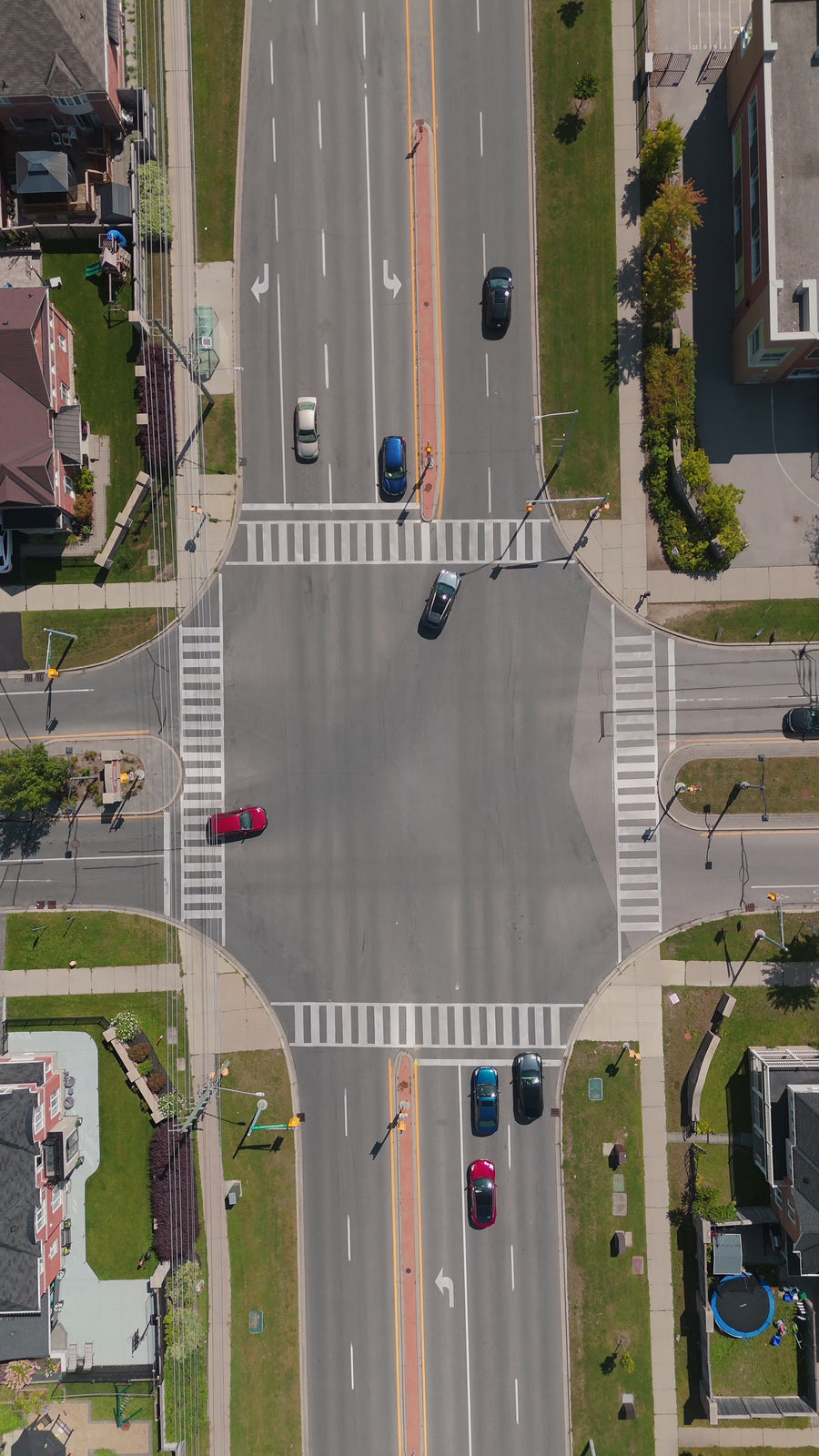Suburban Intersection Traffic - Top Down Aerial