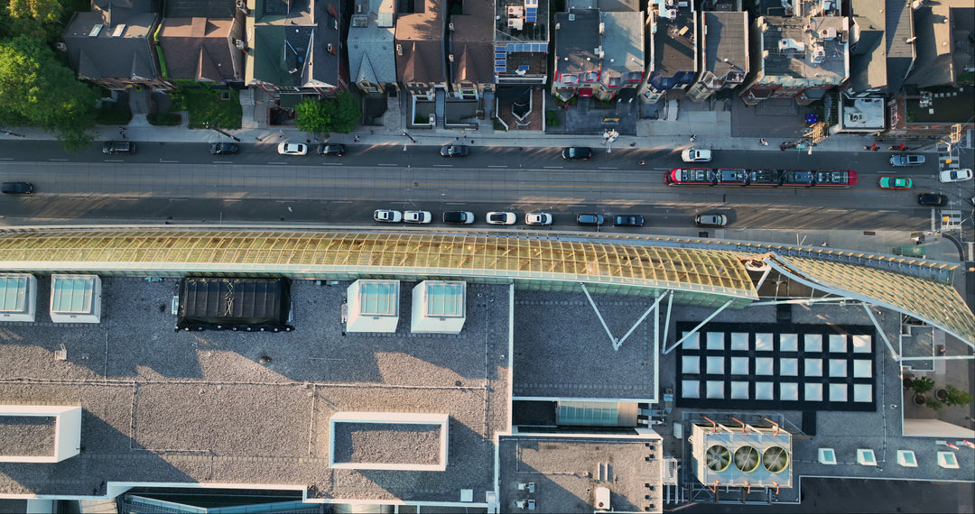Modern Art Gallery and Urban Street Traffic - Top Down — 4K stock footage