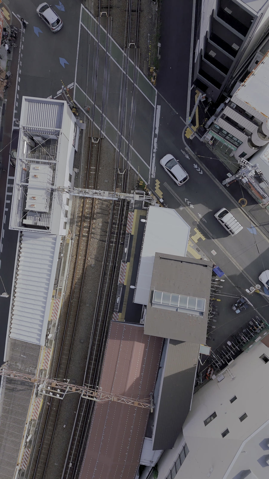 City Street with Railway Crossing - Vertical Aerial