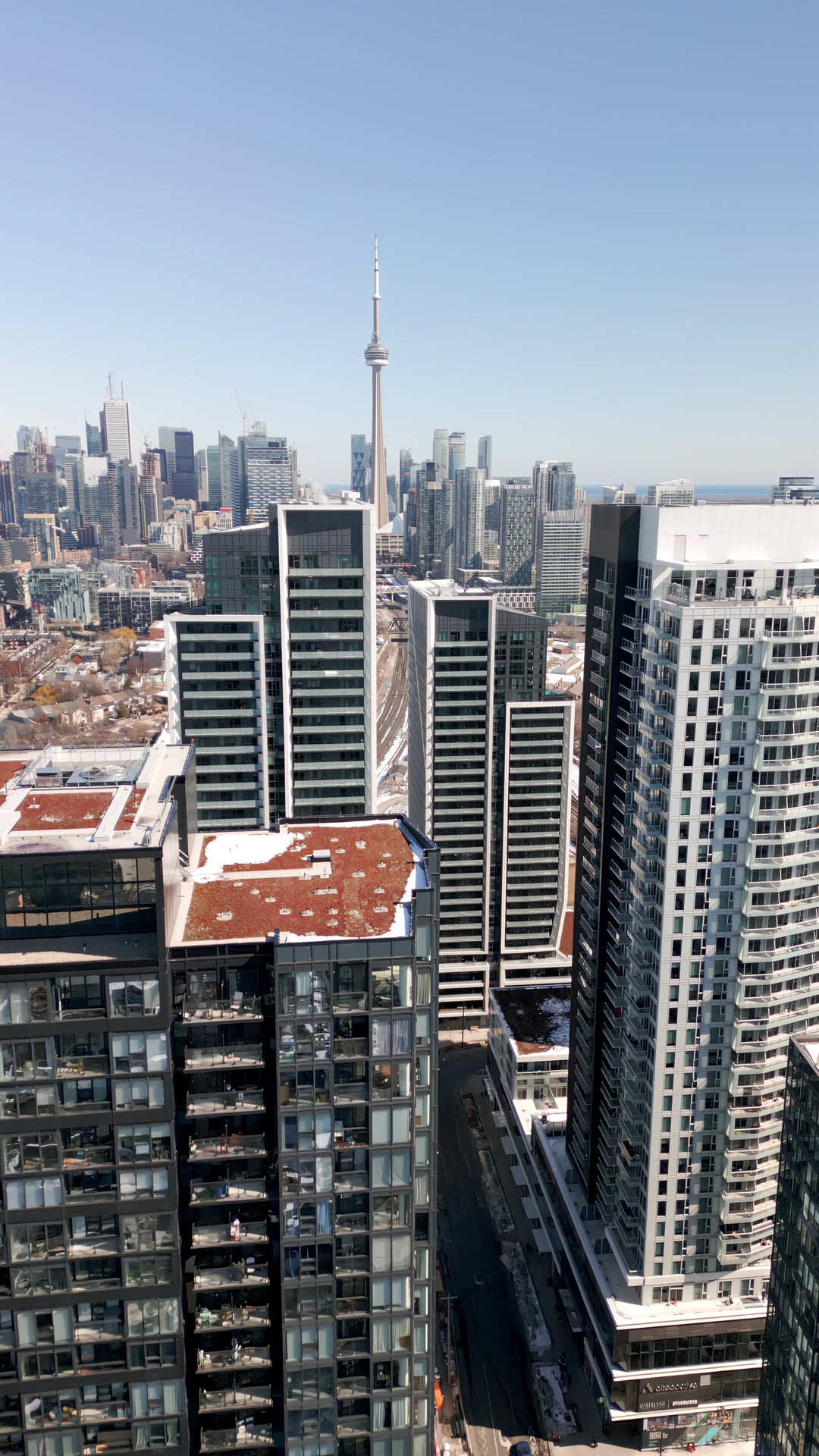Toronto CN Tower and Condos in Winter - Vertical Aerial